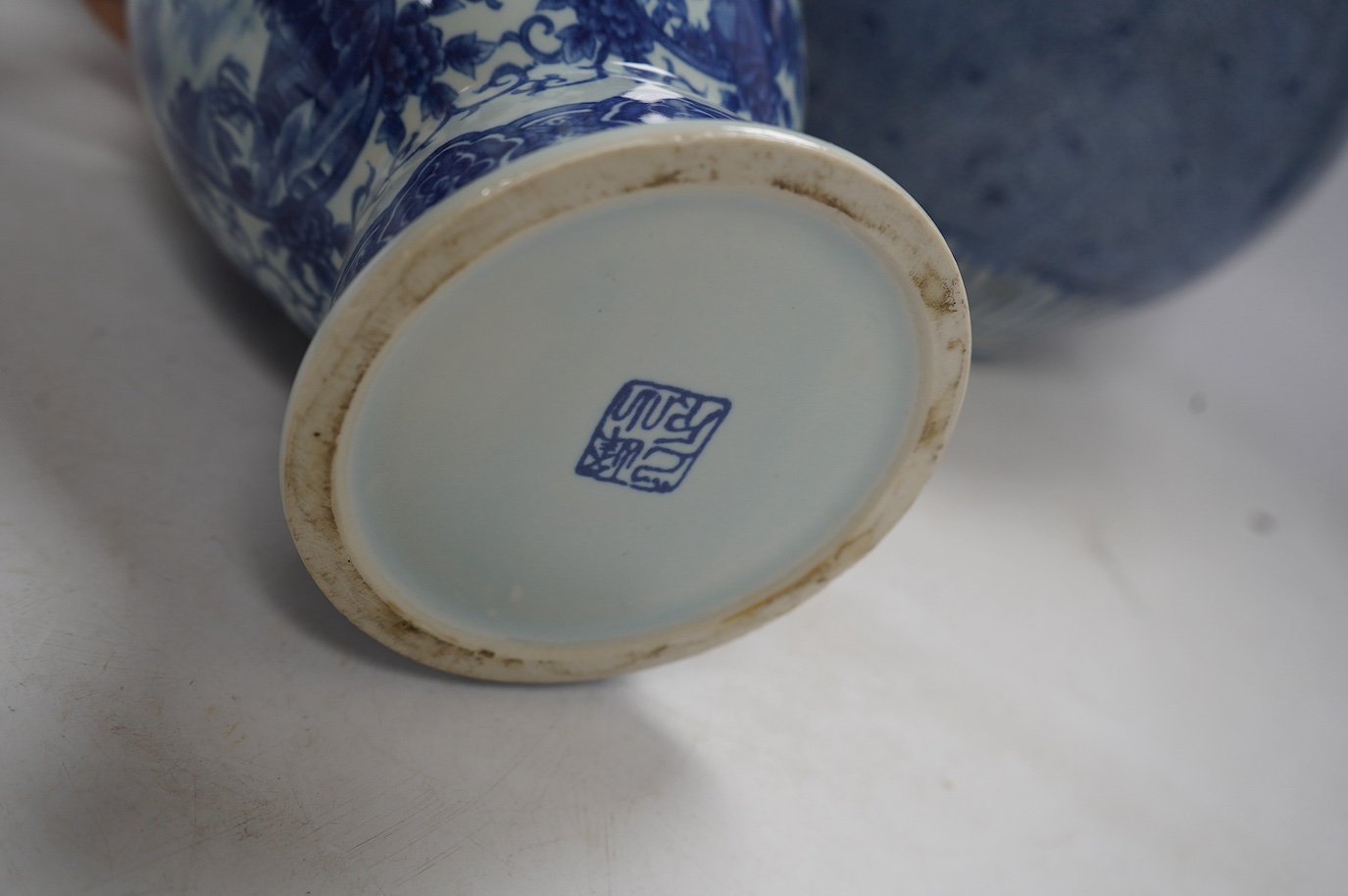 Four Chinese blue and white vases, a jar and cover and a tea bowl, Kangxi to 20th century, tallest vase 38cm high. Condition - poor